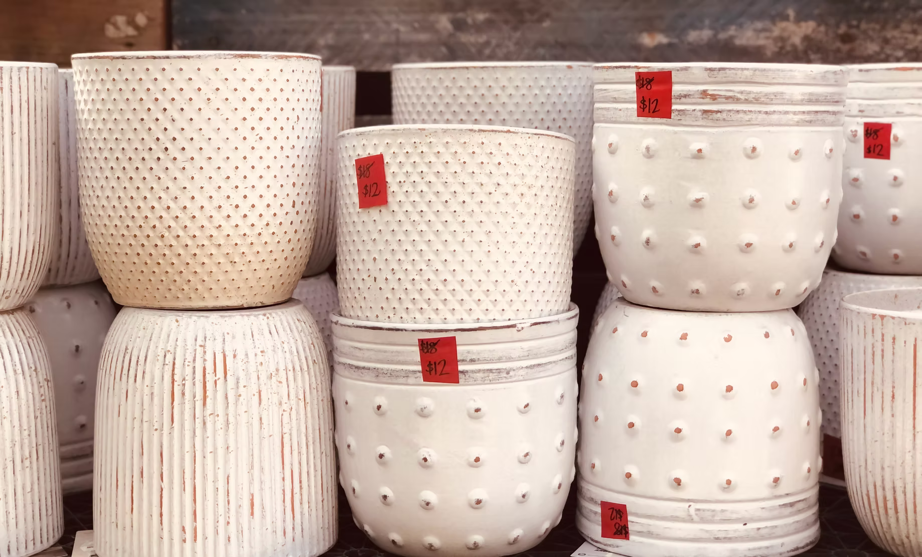 Stacked ceramic pots and planters in the New Leaf garden shop